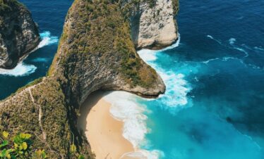 aerial photography of cliff near shore