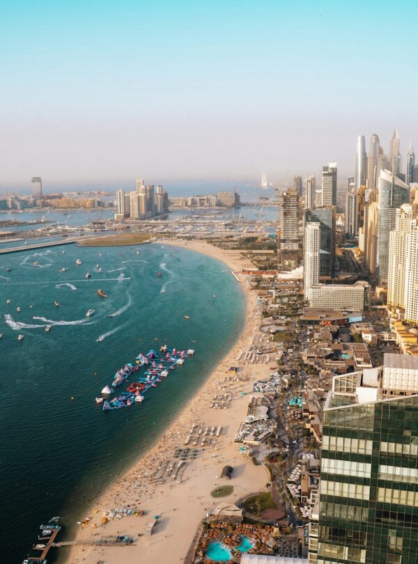 Dubai's coastline and cityscape from an aerial view.