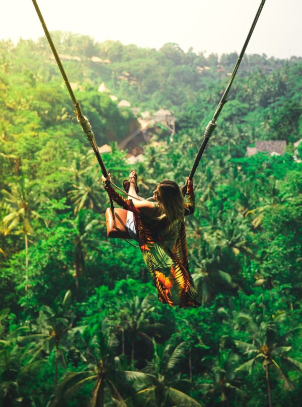 woman riding swing