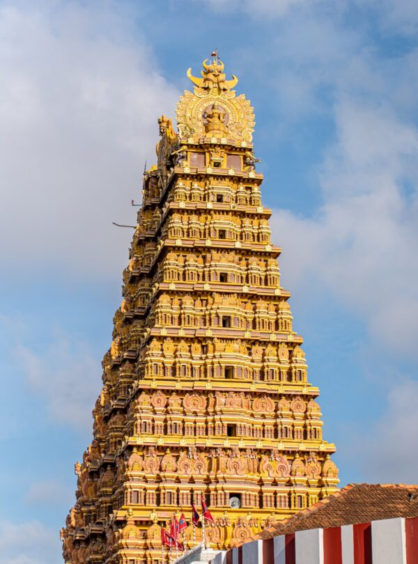 A tall tower with a clock on top of it