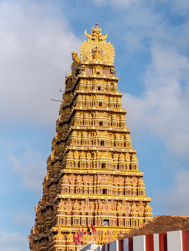 A tall tower with a clock on top of it