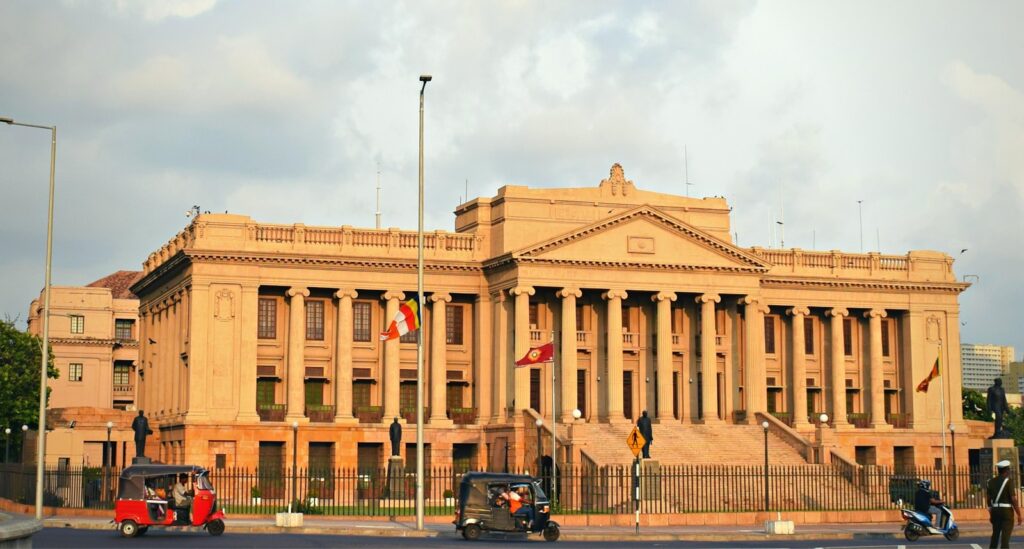 a building with flags on the roof