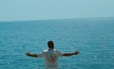 a man standing on a boat