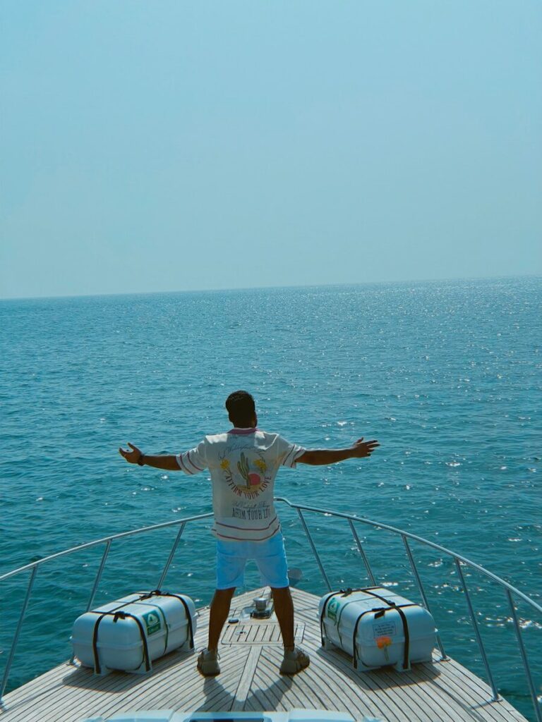 a man standing on a boat