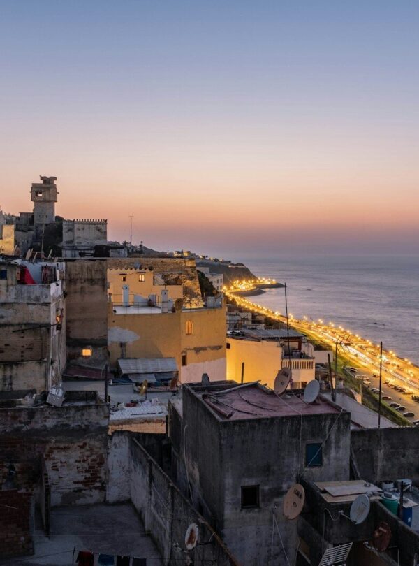 concrete buildings near shore