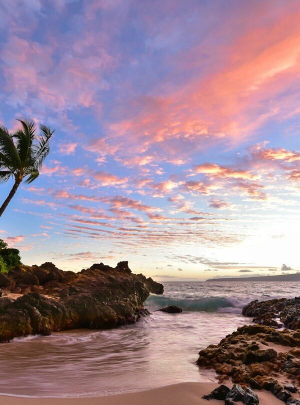 a beach that has some rocks in it