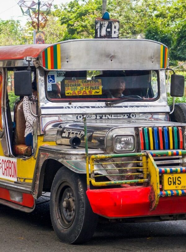white and red truck on road during daytime