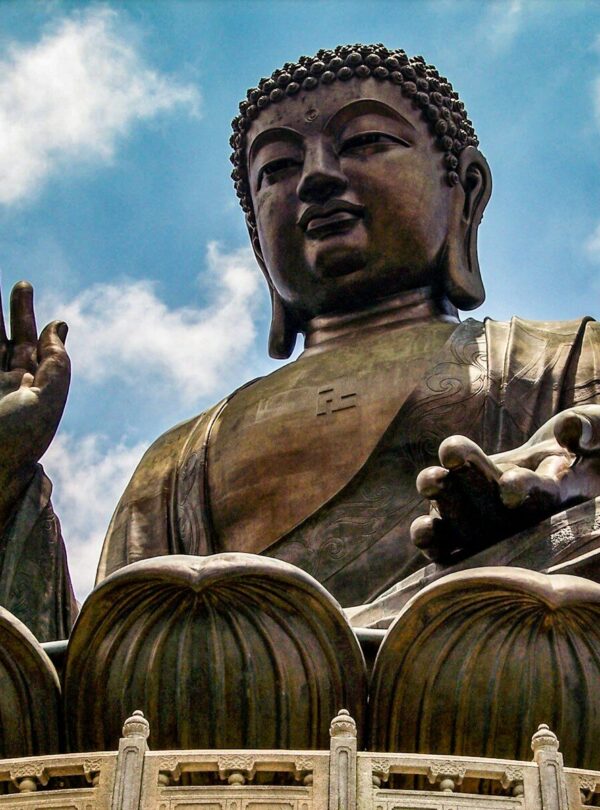 a large statue of a person holding a baby