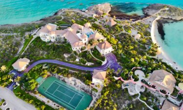 Luxury villa with tennis court on tropical island
