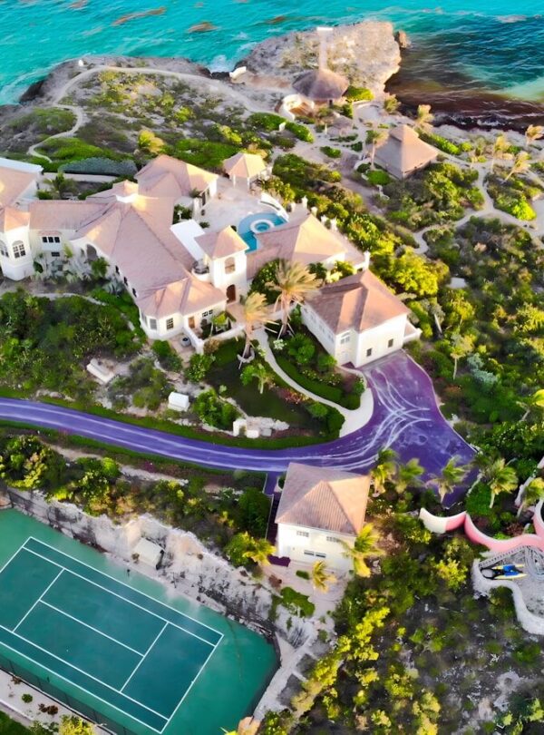Luxury villa with tennis court on tropical island