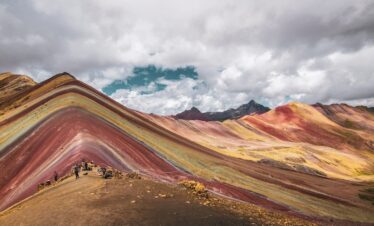 mountain under gray clouds