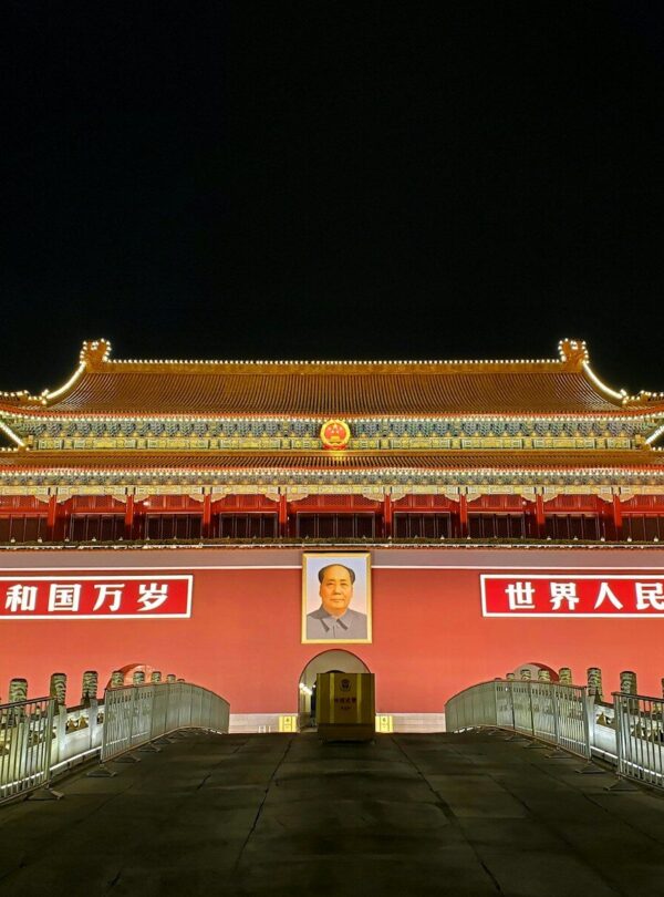 red and white concrete building during nighttime