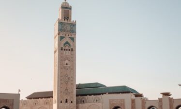 a large building with a clock tower in the middle of it