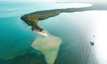 a small island in the middle of a body of water