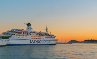 white cruise ship on sea during daytime