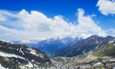 people on snow covered mountain during daytime
