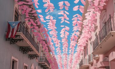 a street lined with pink and white buildings