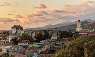 aerial view of city near mountain during daytime