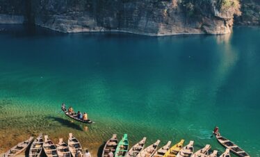 landscape photo of boats near body of water