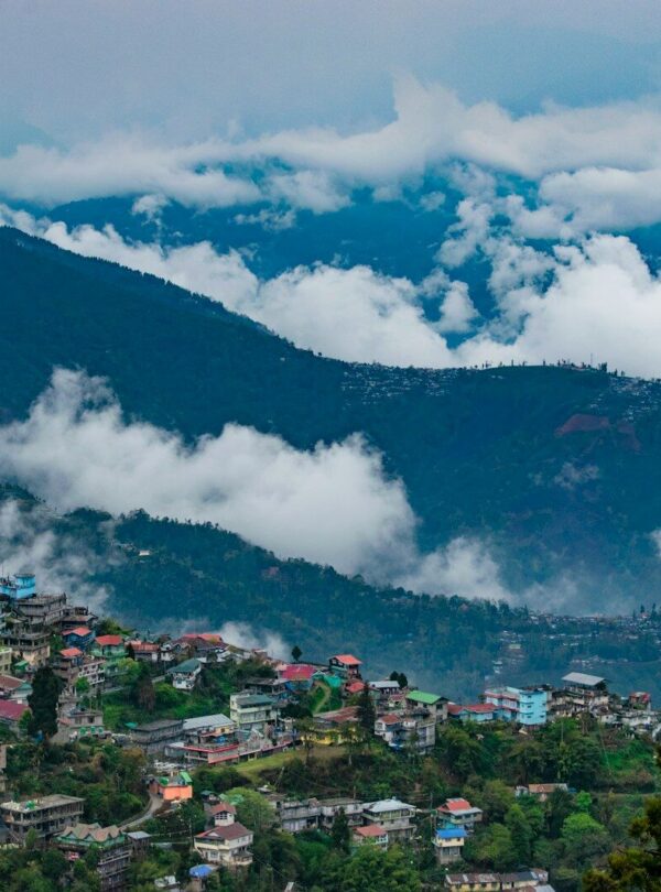aerial view of city near mountain during daytime