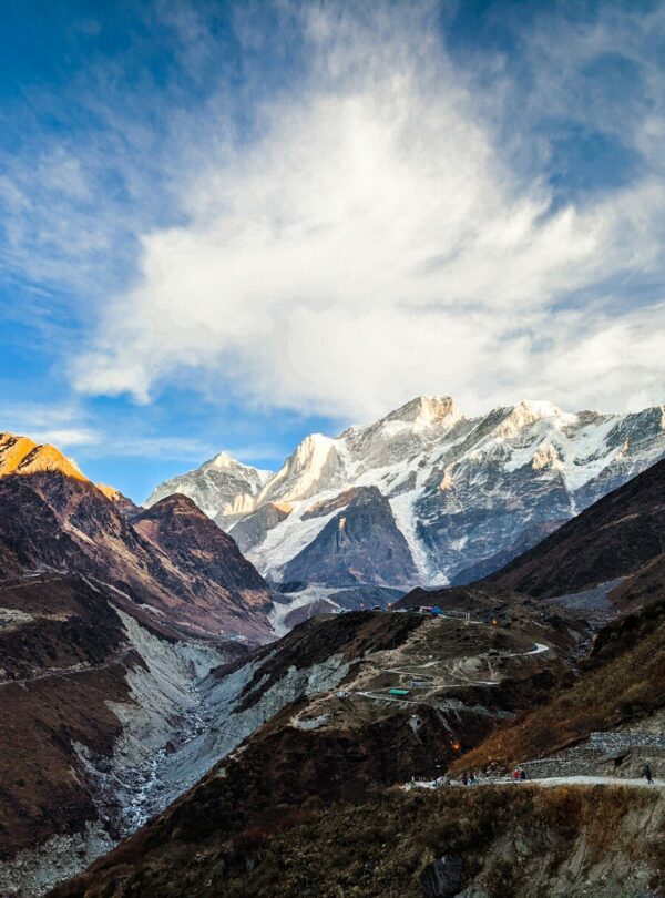 snow covered mountains under blue sky during daytime