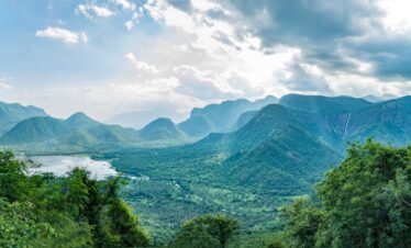 green mountains under white clouds during daytime
