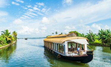 brown wooden boat on water during daytime